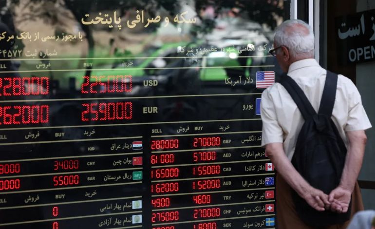 War Drives Iran’s Currency to a New Record Low Amid Economic Turmoil